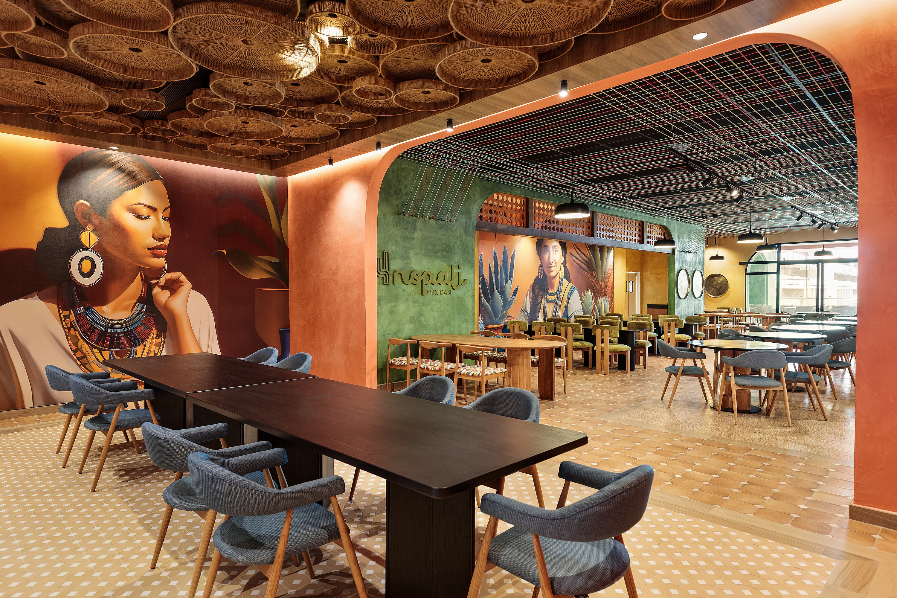Serenade Caribe Club: vibrant dining with Mexican art and colorful accents.