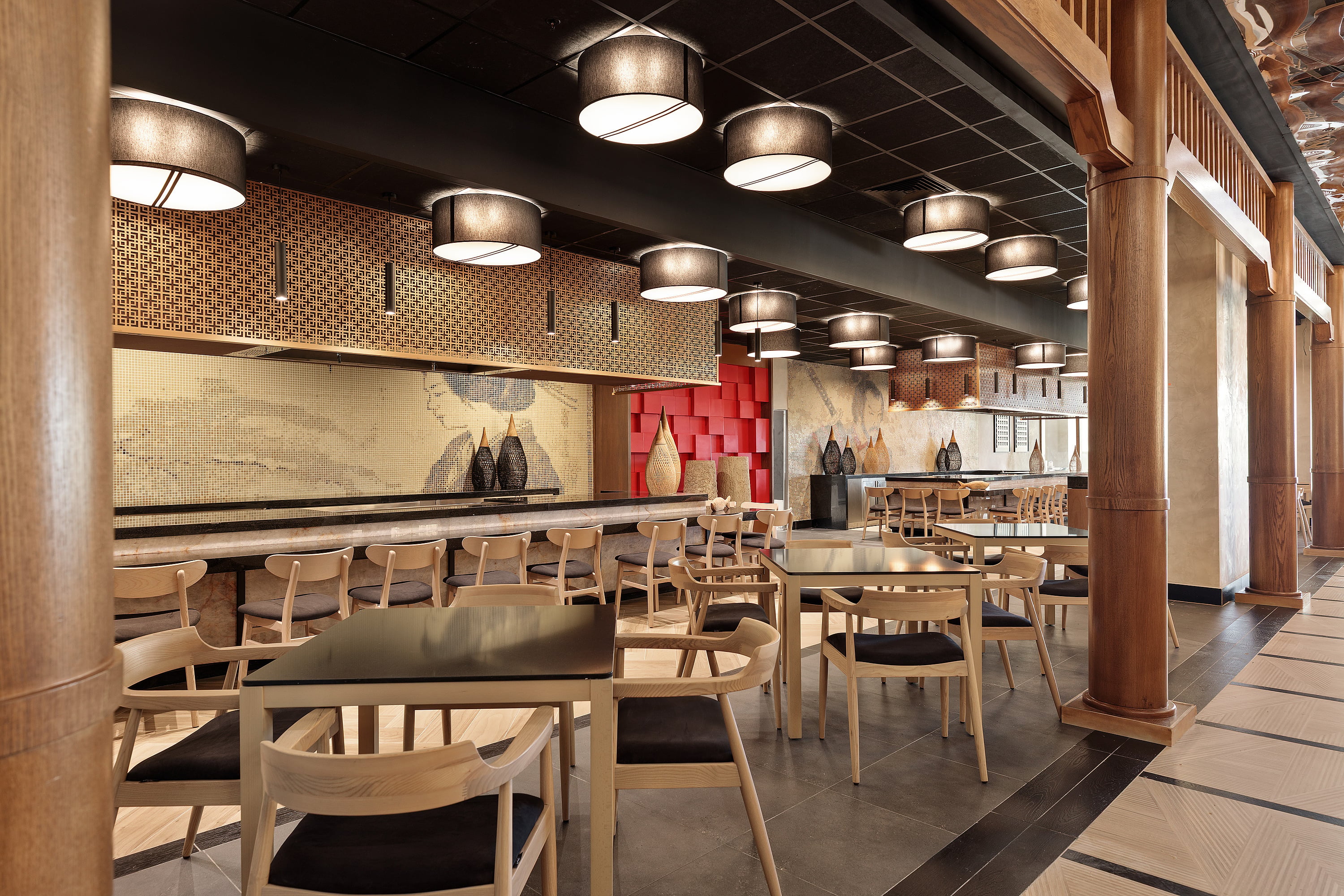 Serenade Caribe Club interior design with decorative fish and Asian style.
