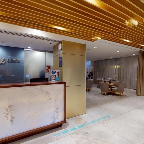 a reception area with a sign that says smv usca