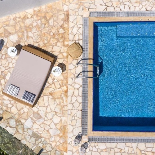 an aerial view of a large swimming pool