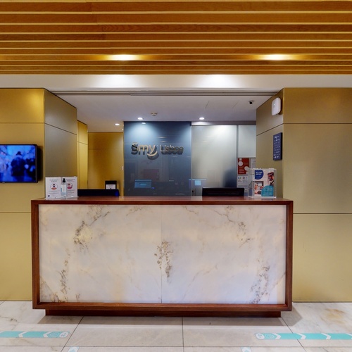 a lobby with a sign that says sky lounge