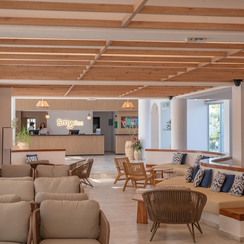 a lobby of a hotel with a sign that says smyths