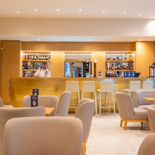 a bar with a sign that says ' bar ' on it