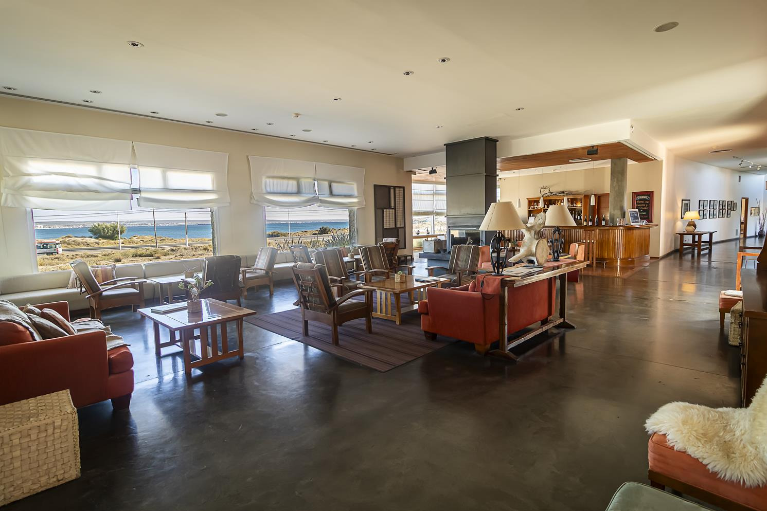 Hotel Territorio 4*: Serene mountain lake view from hotel, Puerto Madryn. Official site.