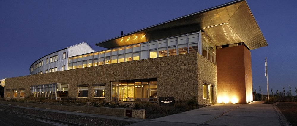 Hotel Territorio 4*: Serene mountain lake view from hotel, Puerto Madryn. Official site.