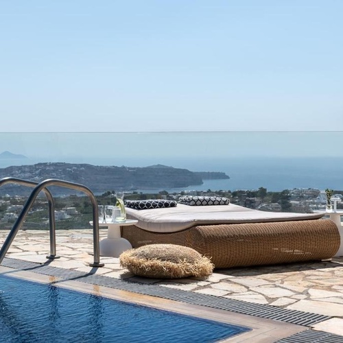a swimming pool with a view of the ocean