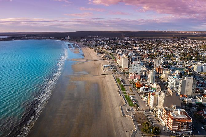 Hotel Territorio 4*: Serene mountain lake view from hotel, Puerto Madryn. Official site.