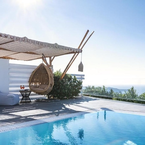 a swimming pool with a canopy over it