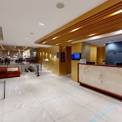 a lobby with a sign that says ' little kings ' on it