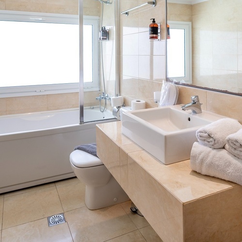a bathroom with a sink toilet and bathtub
