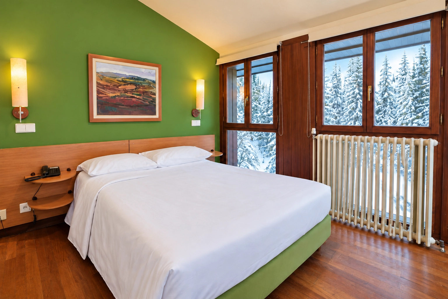 Chambre confortable avec vue sur la neige à SNO: Candanchú. Lit douillet et radiateur.