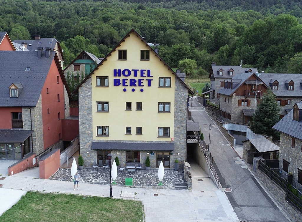 an aerial view of the hotel beret in the mountains