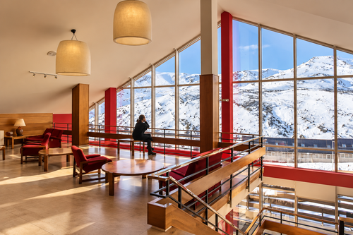 Relaxing lounge with mountain views at SNÖ La Corza Blanca | SNÖ Hotels Official.