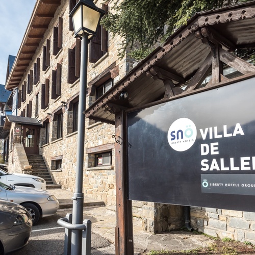 a building with a sign that says villa de sallent