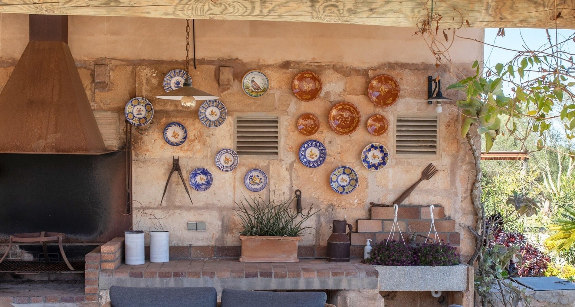 a wall with plates on it including one that says ' a ' on it