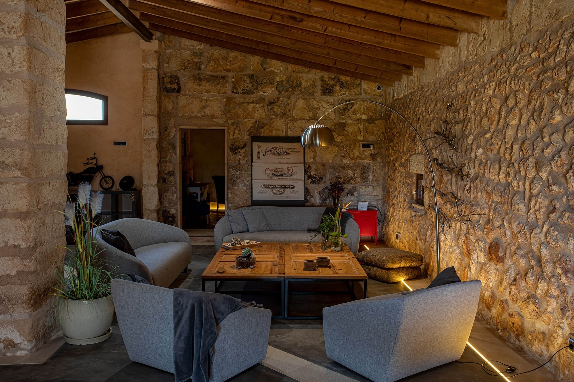 a living room with a couch and two chairs