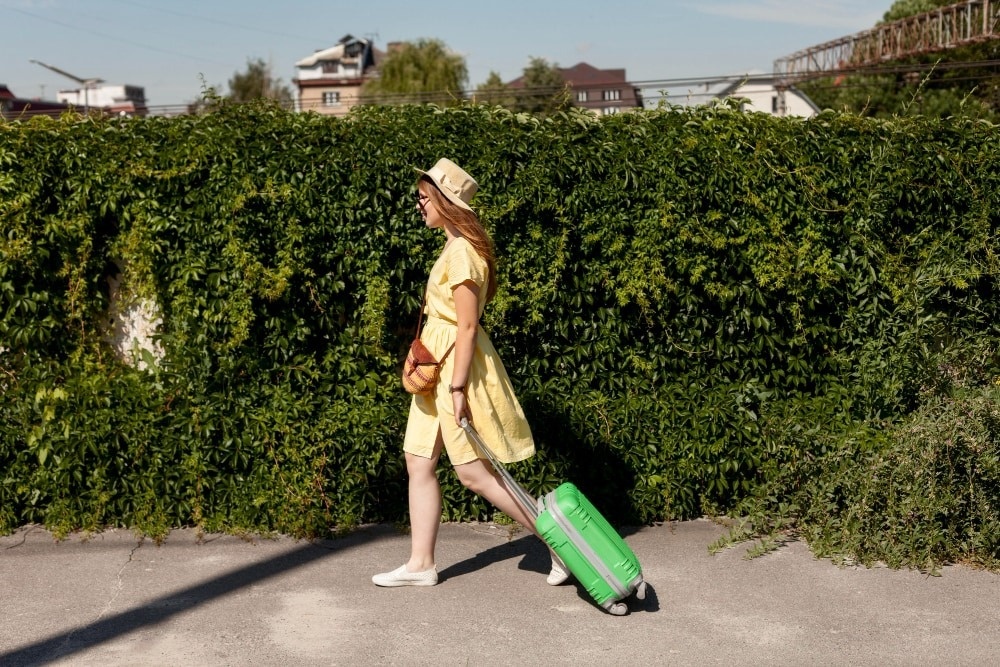 a large swimming pool surrounded by umbrellas and chairs