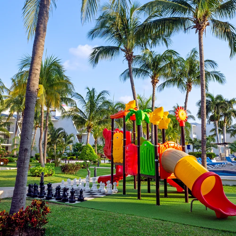 Sunset World Resorts: Corporativa, playground & giant chess at a tropical resort.