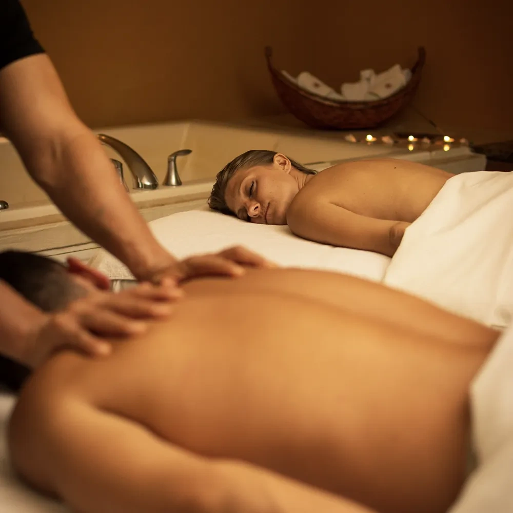 Sunset World Resorts: Corporativa couples massage for ultimate relaxation.