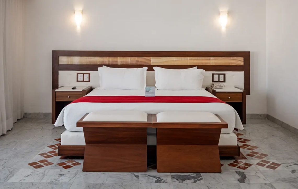 Cama king-size en Sunset Marina Resort & Yacht Club.