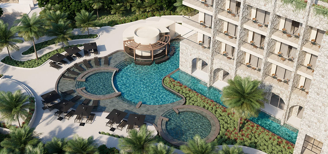 Hacienda Tres Rios: Luxurious resort pool with cabanas and balconies.