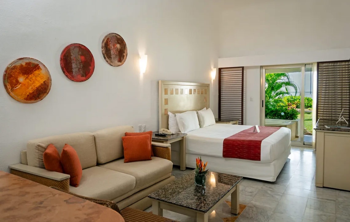 Suite acogedora con vista al jardín en Sunset Marina Resort & Yacht Club