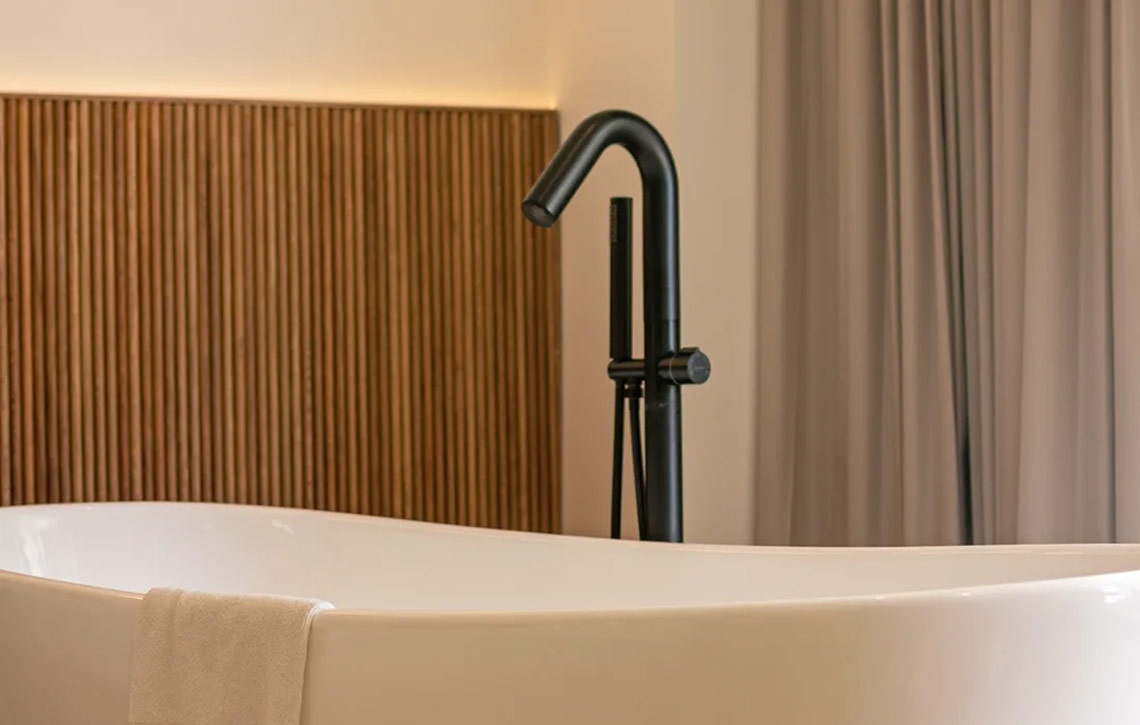 Modern black faucet over soaking tub at Hacienda Tres Rios | Official Page