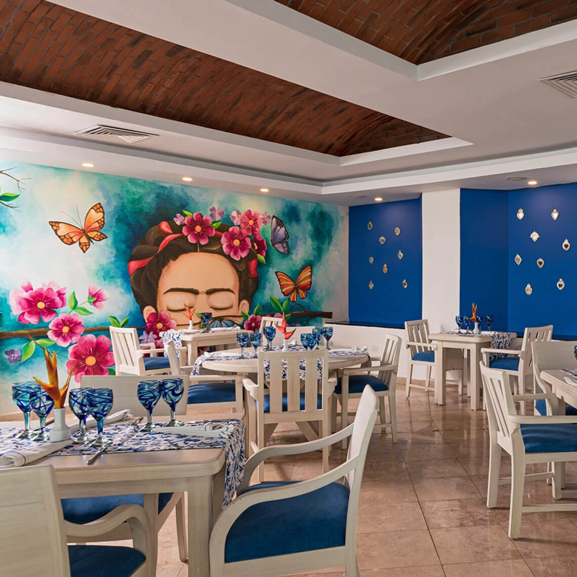Frida Kahlo mural restaurant at Ocean Spa Hotel | Official Page.