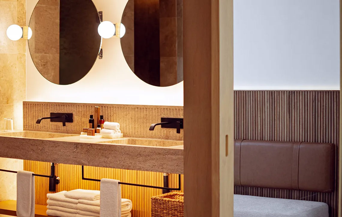 Modern hotel bathroom with double sinks and sleek fixtures, Hacienda Tres Rios.