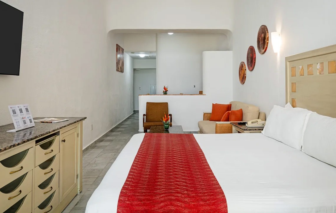 Habitación acogedora en Sunset Marina Resort & Yacht Club | Página Oficial.