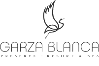 a black and white logo for garza blanca with a bird on it .