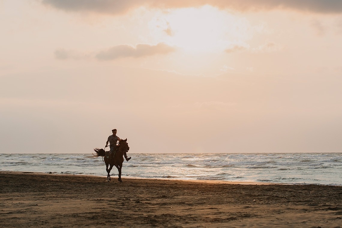 a fireworks display in the night sky over a city