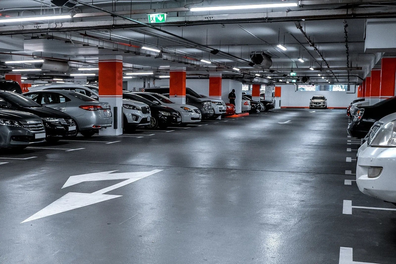 Tequendama: Corporativa hotel underground parking with cars.