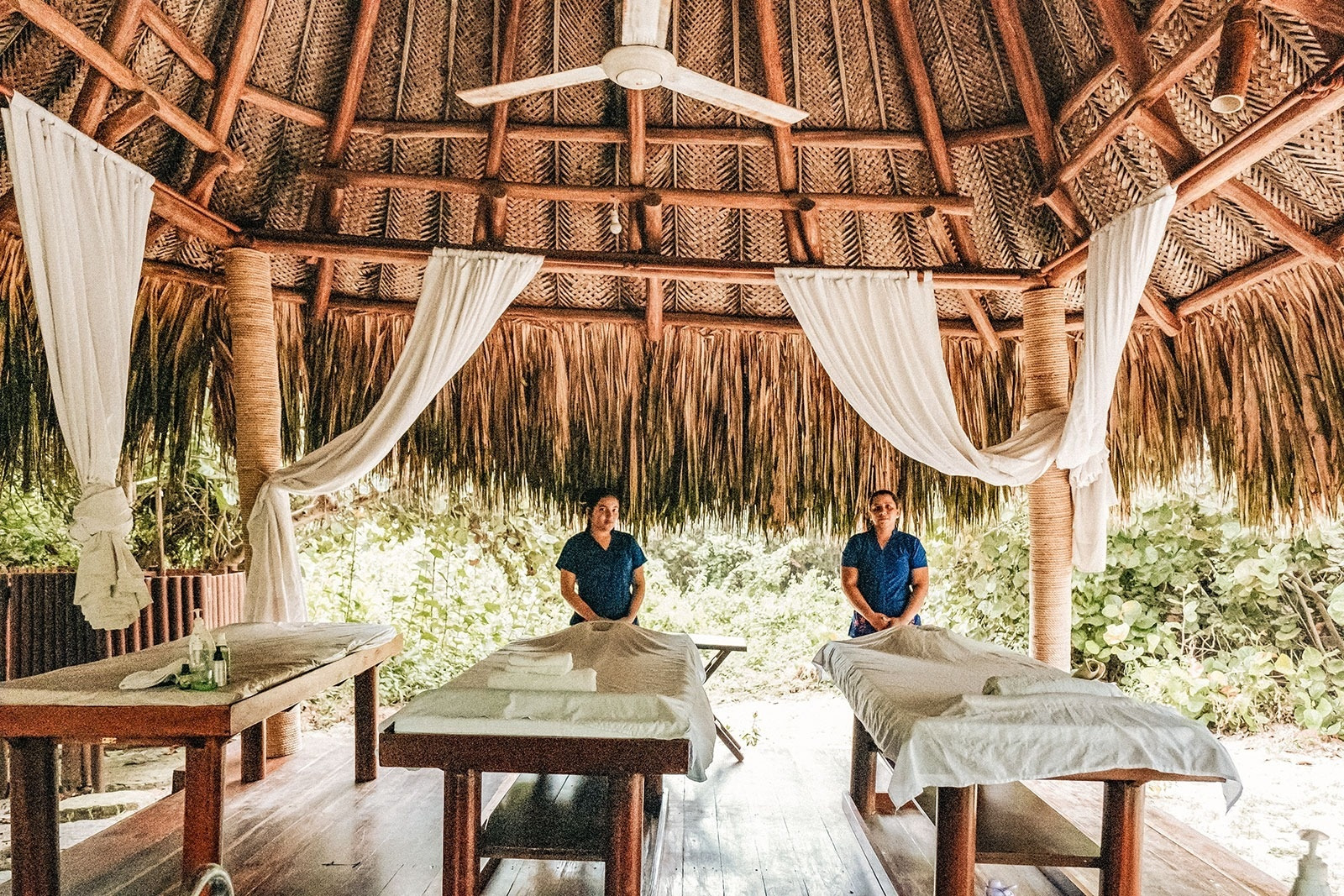 Two massage therapists at Ecohabs Tequendama, Tayrona Park Eco-Hotel.