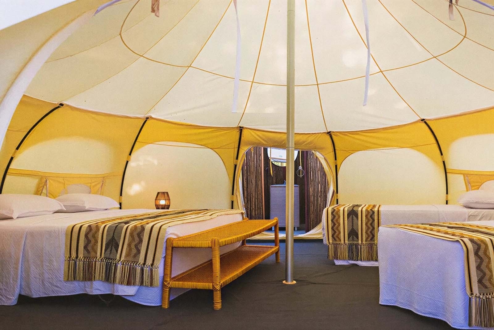Comfortable beds in a glamping tent at Marine Beach Club & Hotel | Hotel in Cartagena.