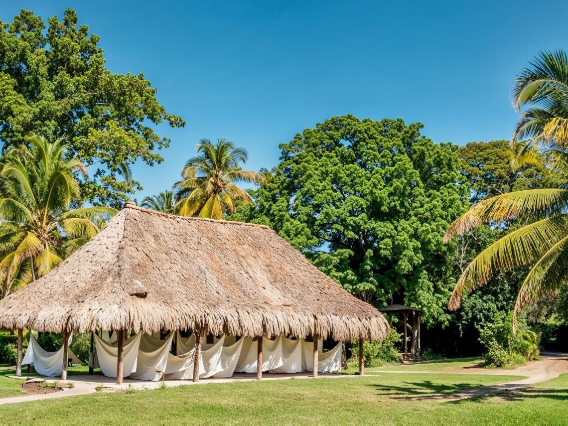 Tequendama Santa Marta hotel bungalow with thatched roof and white drapes. Official website.