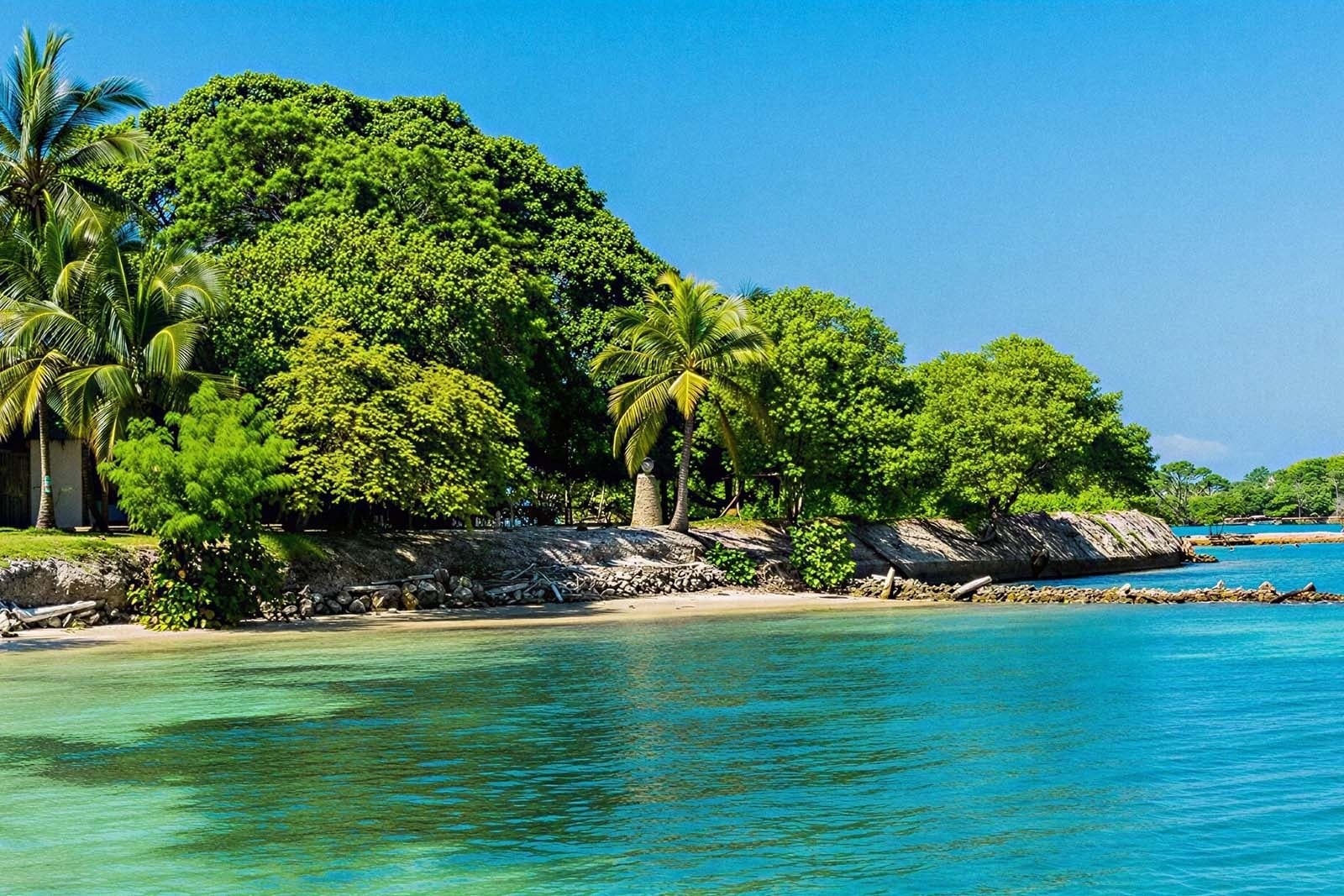 Hotel Rosario de Mar | Turquoise waters & lush island views await you.