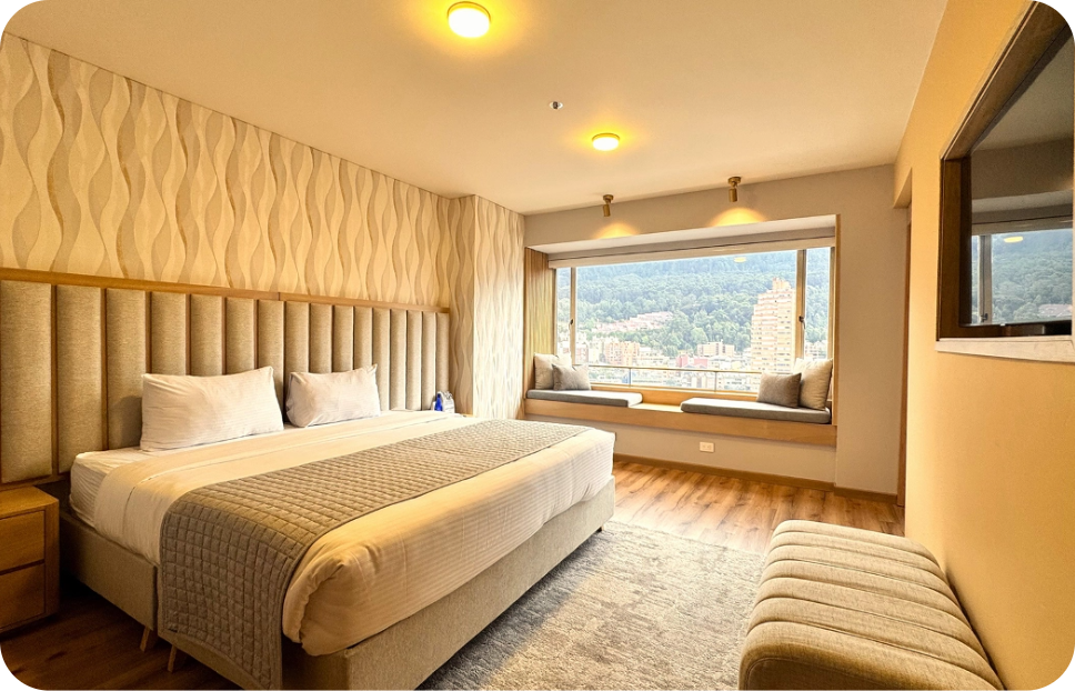 Habitación de hotel Tequendama: Corporativa con vista panorámica y cama cómoda.
