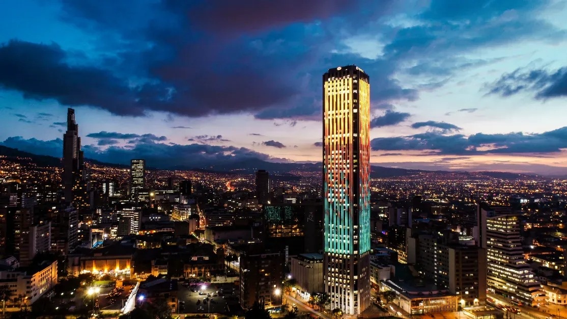 Hotel Tequendama: night view of the Corporate Tower with colorful lights.