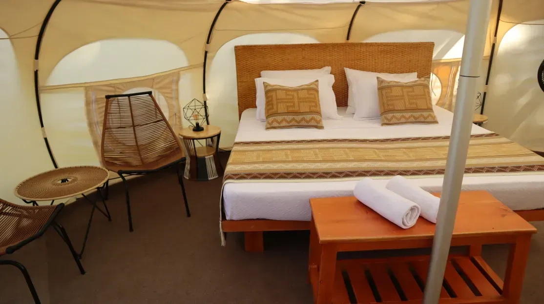 Cabañas Tequendama | Hotel en Parque Tayrona: acogedora cama en glamping de lujo.