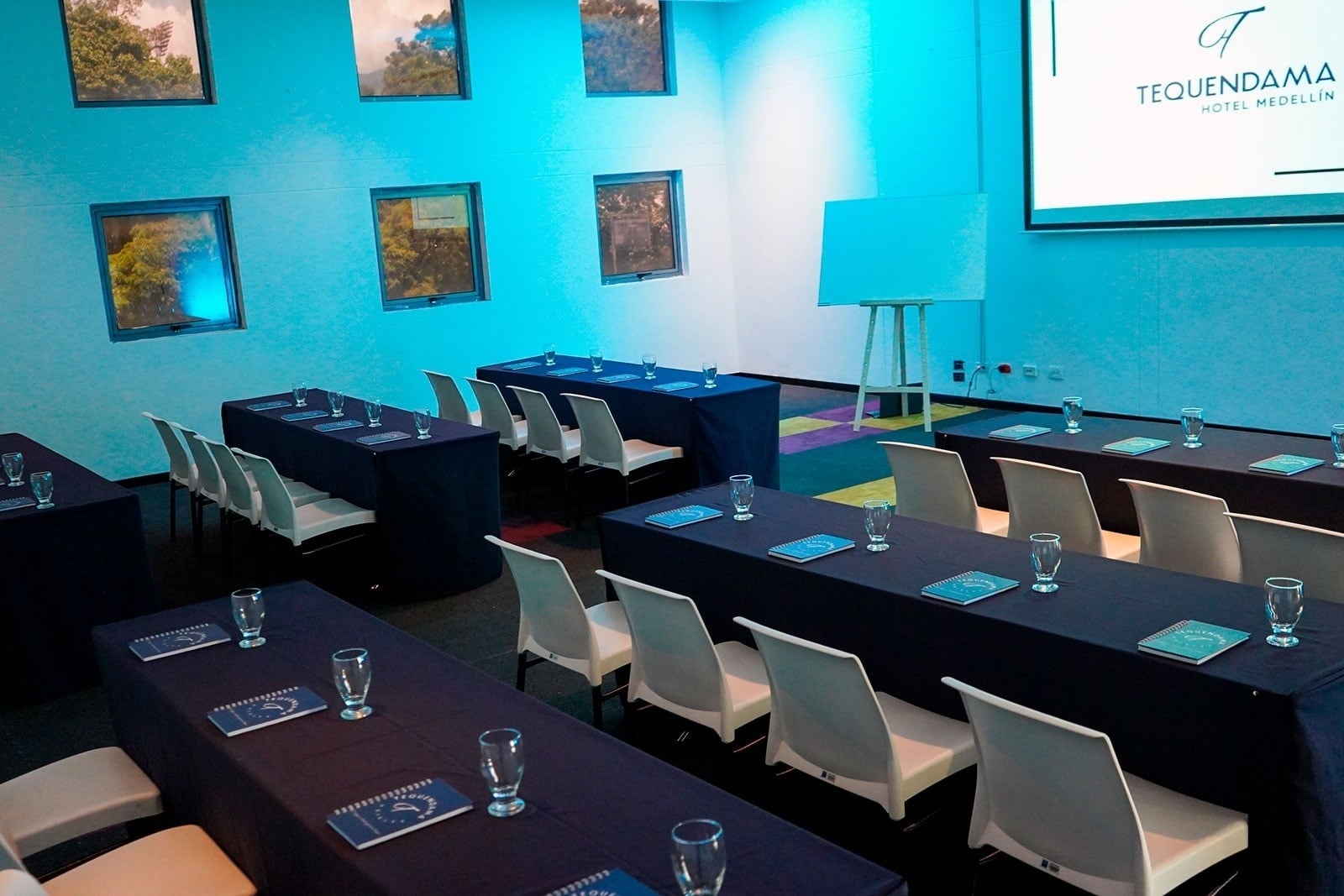 Tequendama Hotel Medellín | Modern meeting room set up for event with chairs and tables.