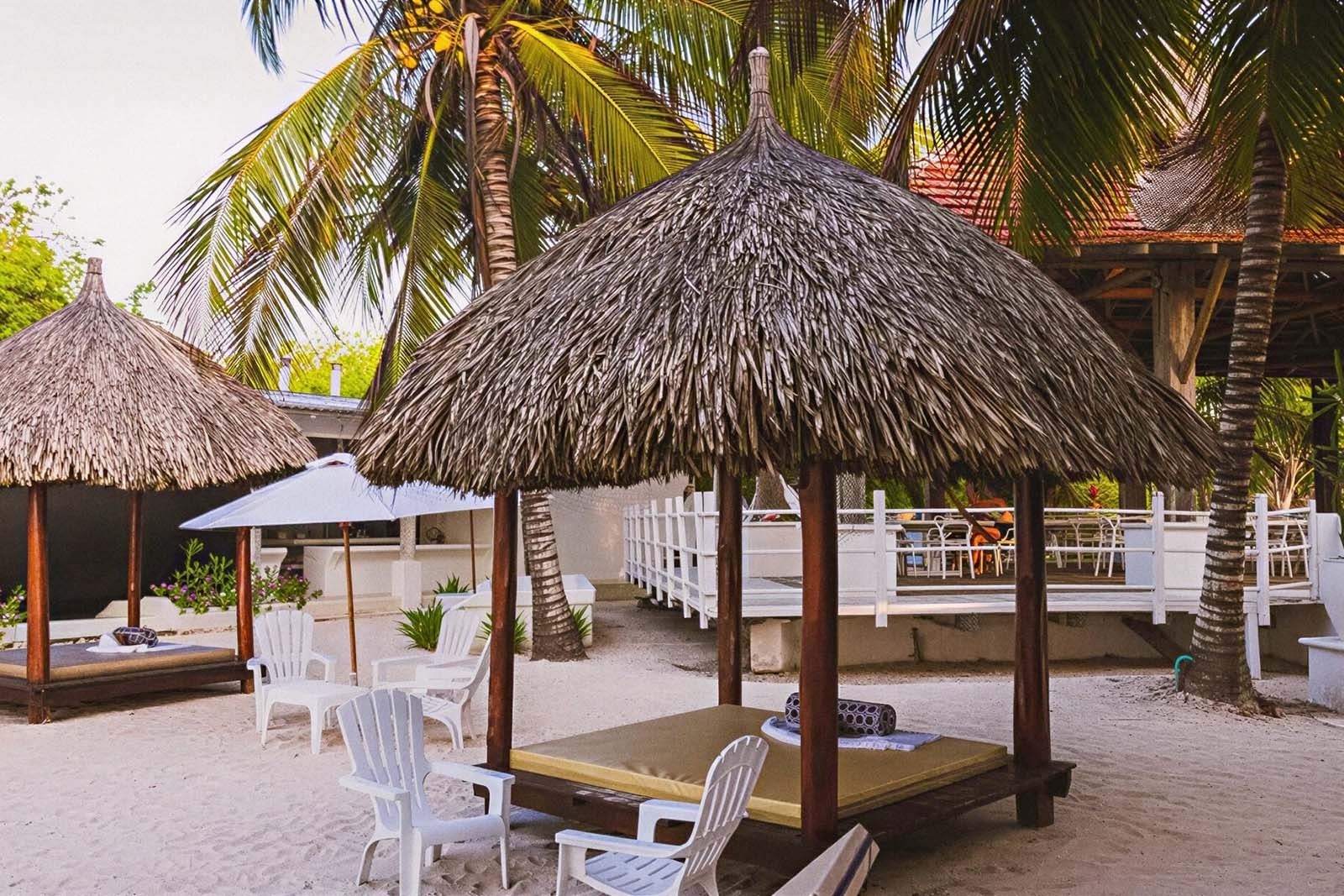 Beachfront cabanas with plush beds at Marine Beach Club & Hotel, Cartagena.