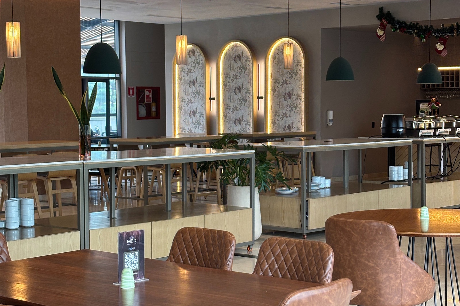 Tequendama: Corporativa dining area with plush seating and modern decor.