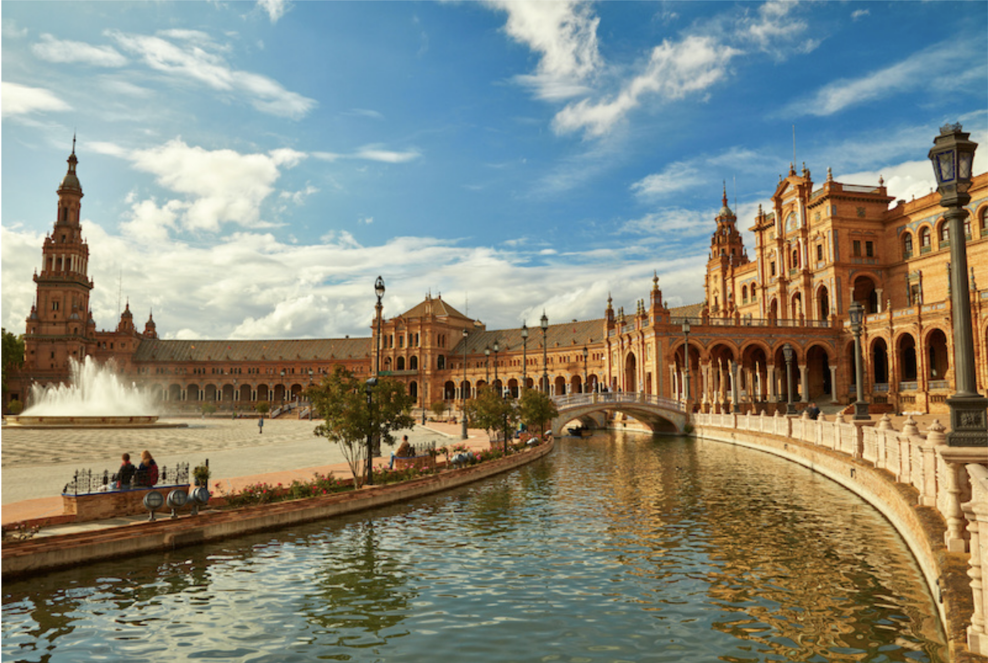 Plaza de España, Seville Época Suites Sevilla hotel: Historic building with fountains and canal.