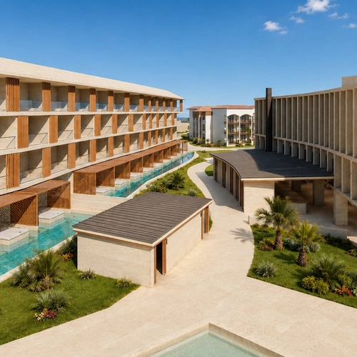 Edificios y piscinas de Impressive Royal Punta Cana entre jardines