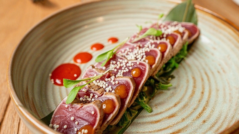 a close up of a plate of food on a table