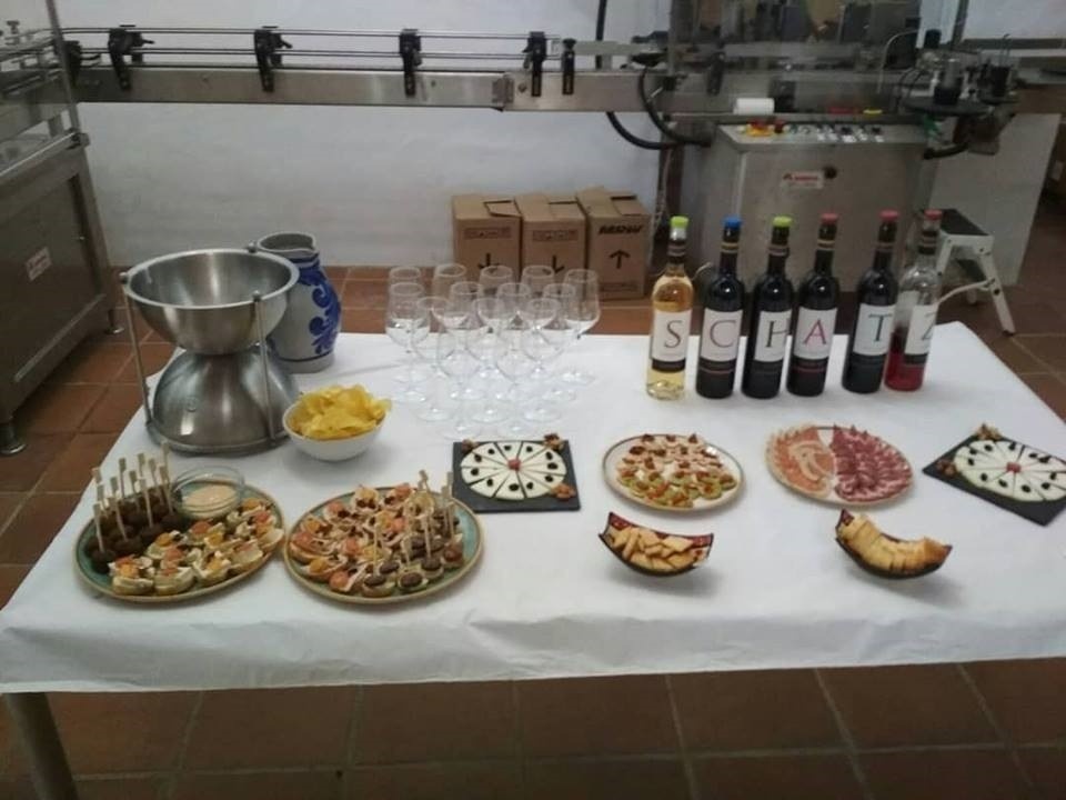 several bottles of schatz wine are lined up on a table