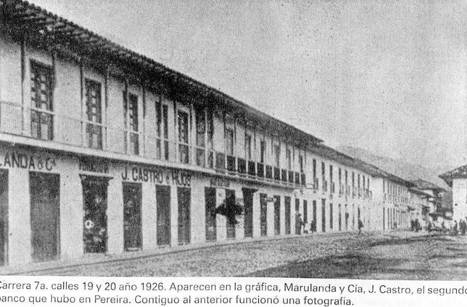 a black and white photo of a building in 1926