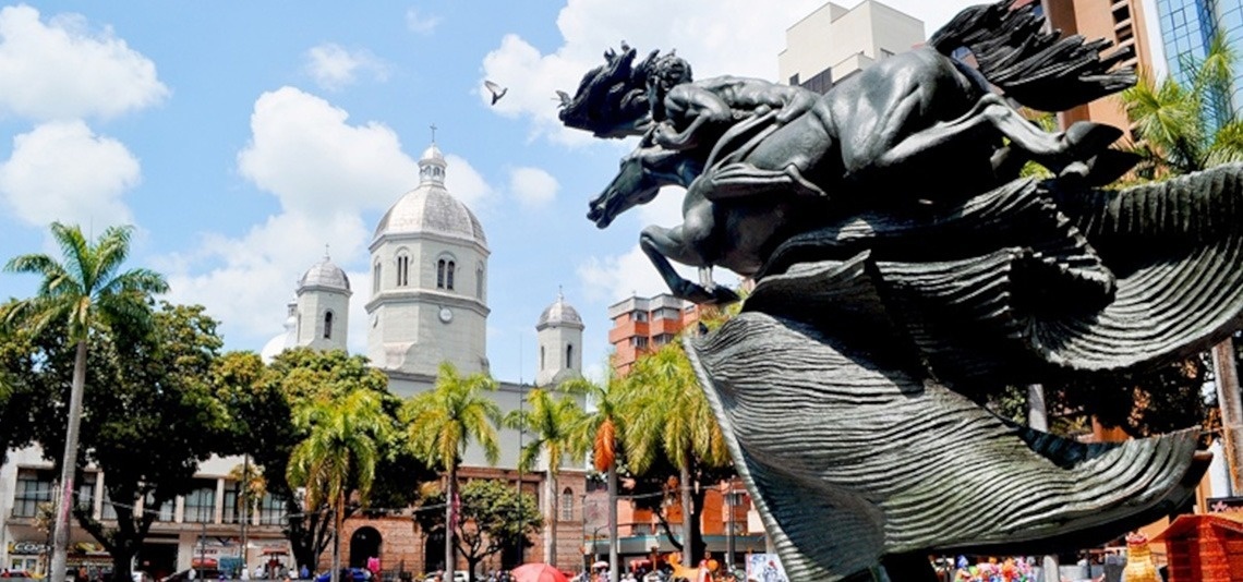 the word hotel is on the wall behind the tables