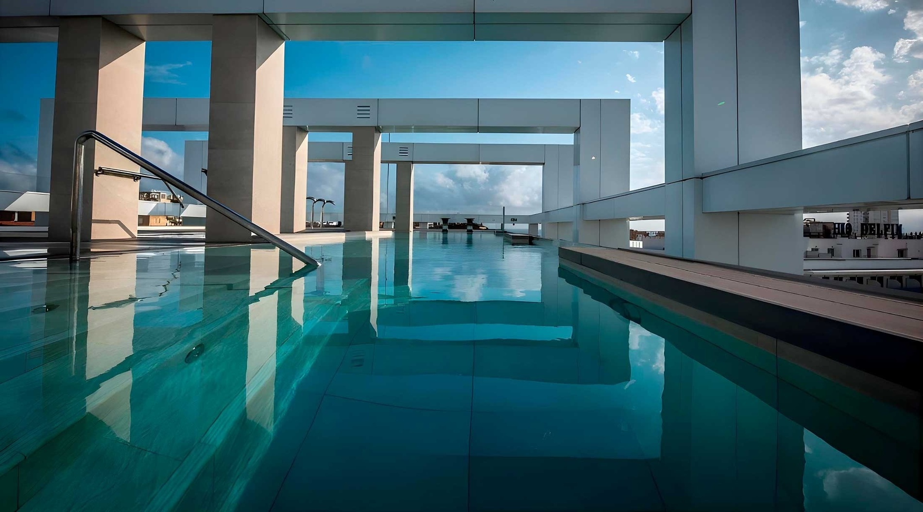 a man is carrying a woman on his back on the beach